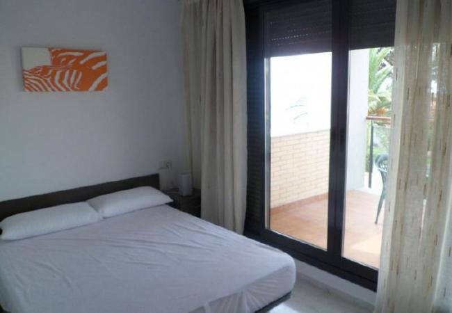 The master bedroom The master bedroom has a double bed and a bedside table. Bedsheets are included.